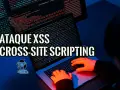 Ataque XSS: Cross-Site Scripting. Manos escribiendo código en un portátil, con texto superpuesto sobre la amenaza.