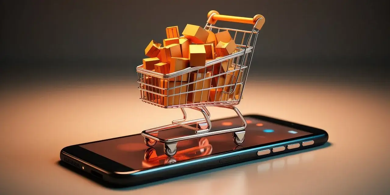 Carrito de compras lleno de cajas doradas sobre un teléfono móvil, simbolizando una posible estafa de compra online.