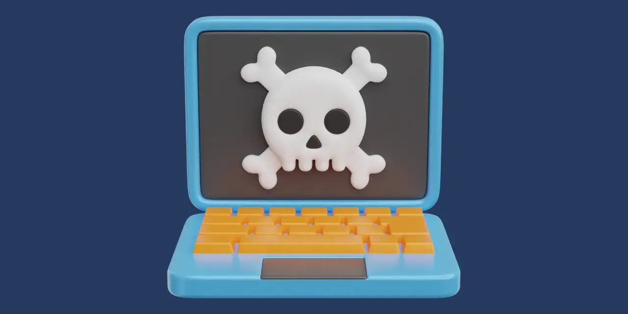 Un portátil azul con un teclado naranja muestra una calavera y tibias cruzadas, un símbolo de peligro. Esto ilustra qué es el scareware.