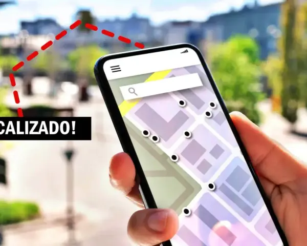 Mano sujetando un móvil con mapa y puntos de localización. ¡Localizado! se puede saber la ubicación de un móvil.