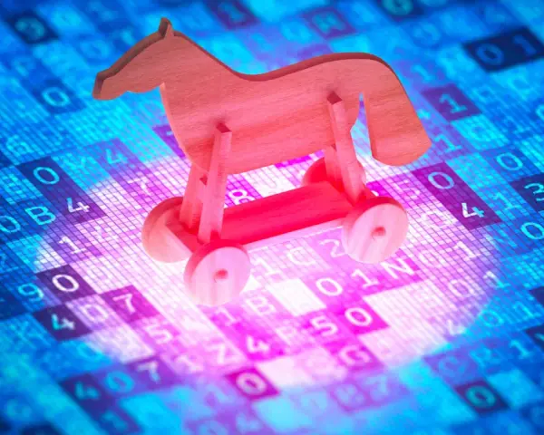 Caballo de madera, un troyano informático, sobre un fondo de código binario y hexadecimal.