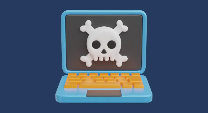 Un portátil azul con un teclado naranja muestra una calavera y tibias cruzadas, un símbolo de peligro. Esto ilustra qué es el scareware.